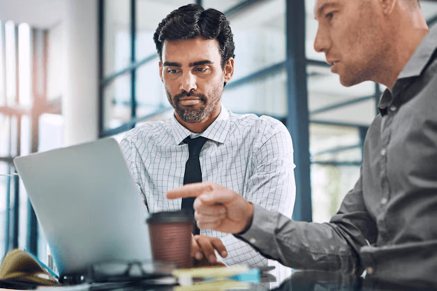 Startup mentorship session laptop meeting