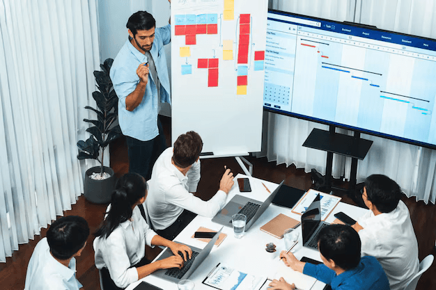 Developers collaborating agile standup meeting